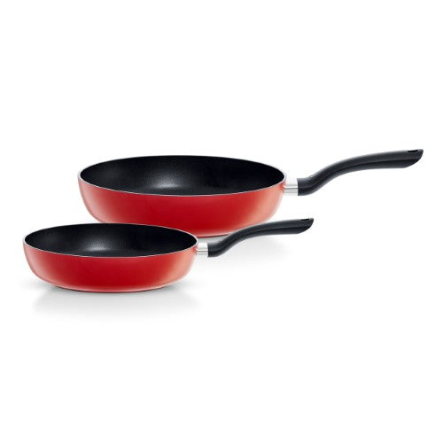 Red 2-piece Fissler Cenit fry pan set (24/28cm) with nonstick coating, ideal for healthy cooking and all stovetop types.