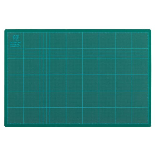 Vibrant green 450x300 cutting mat made from durable 3mm PVC, featuring a self-healing surface and accurate grid layout.