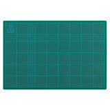 Vibrant green 450x300 cutting mat made from durable 3mm PVC, featuring a self-healing surface and accurate grid layout.