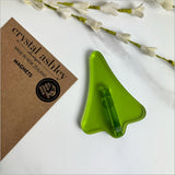 Lime green jet plane-shaped magnet in frosted satin acrylic, perfect for home decor and a fun gift for aviation lovers.