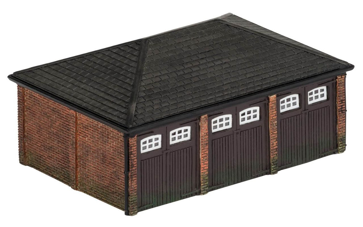 Detailed Hornby Triple Garage model for OO gauge layouts, featuring opening doors for enhanced railway scenes.