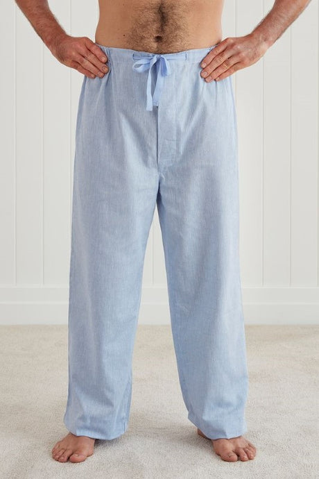 Lightweight PJ pants with elasticated waistband and side pockets, made from certified cotton and linen. Size Small by BAKSANA.