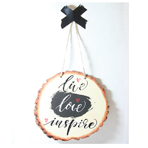 Wall art wood slice featuring 'Live Love Inspire' printed on premium eco-friendly pine veneer, perfect for home decor.