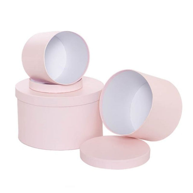 Round baby pink gift box set of 3 in varying sizes, perfect for birthdays and baby showers, made from eco-friendly materials.