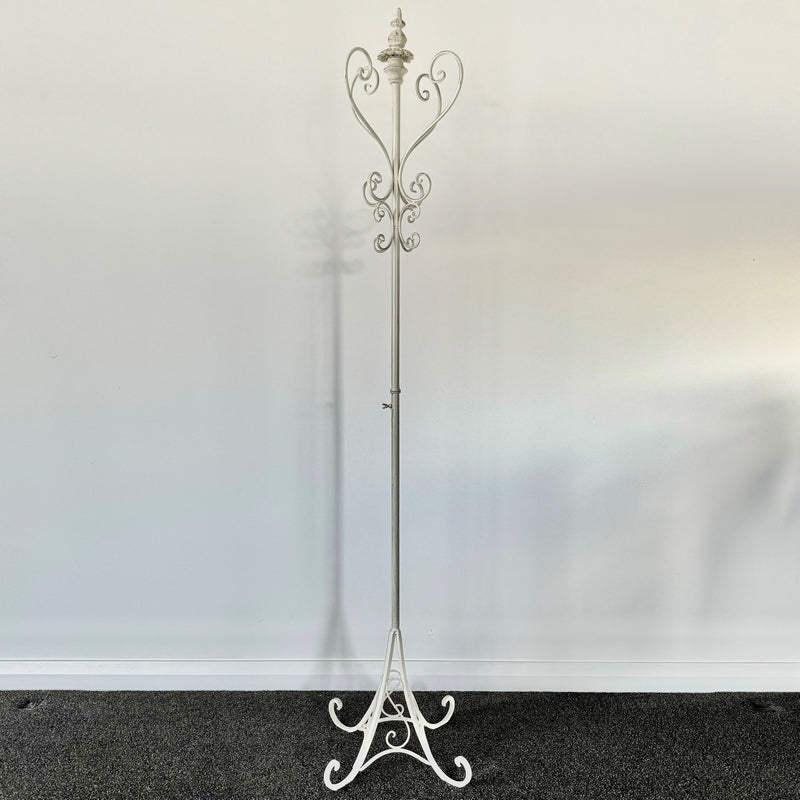 Elegant cream wrought iron coat stand, 178cm tall, features ample hanging space and timeless design for versatile decor.