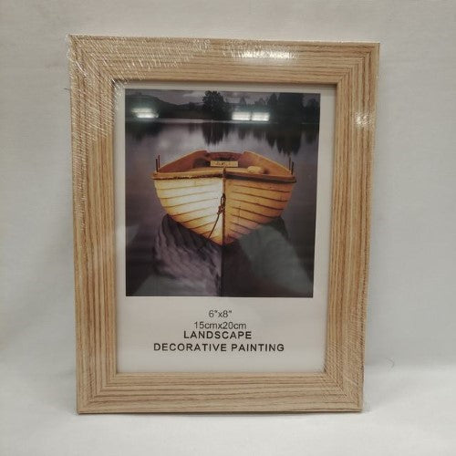 Elegant pack of 12 photo frames in 6x8 cm and 15x20 cm, perfect for showcasing cherished memories in any decor style.