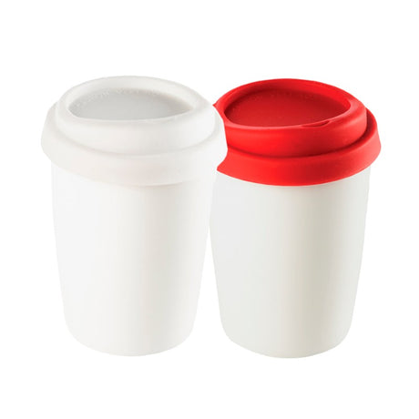 Red double-walled ceramic mug with a silicone lid, ideal for hot drinks at home or on-the-go, elegantly packaged.