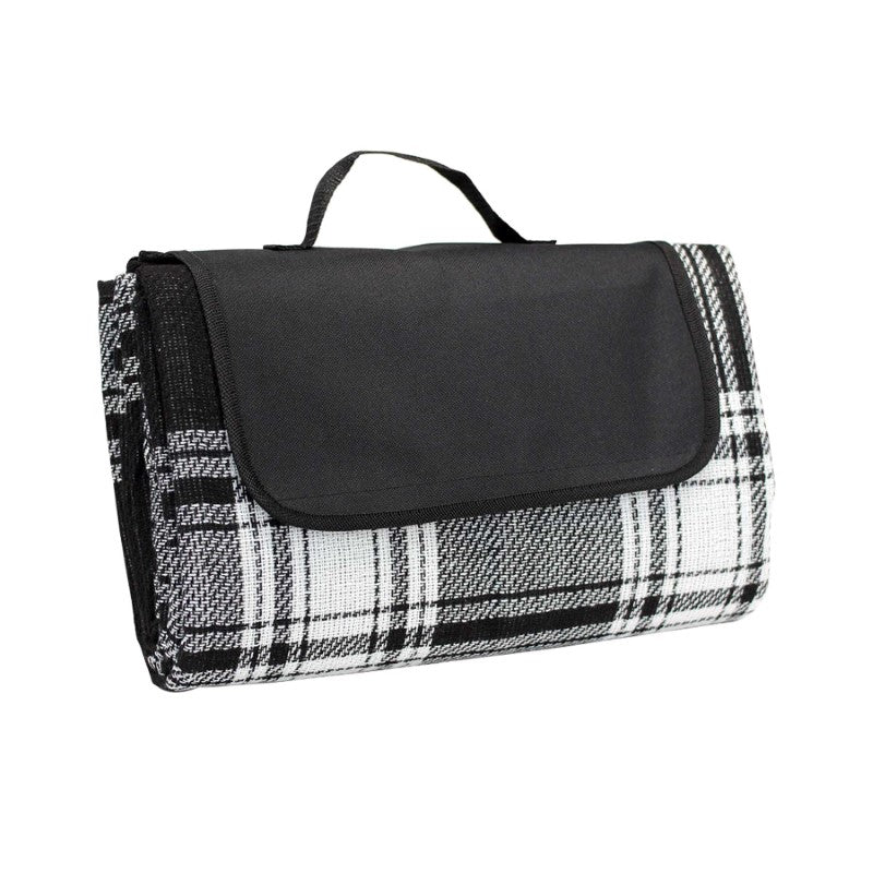 Elegant black picnic rug with waterproof backing, carry handle, and ample space for outdoor enjoyment.