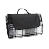 Elegant black picnic rug with waterproof backing, carry handle, and ample space for outdoor enjoyment.