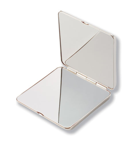 Elegant polished nickel Compact Mirror, portable and stylish with velvet pouch, perfect for on-the-go beauty touch-ups.
