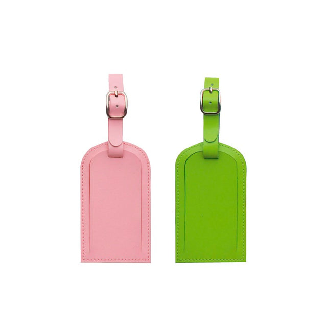 Stylish pink luggage tag made of split leather with adjustable tie and metal buckle, ideal for easy bag identification.