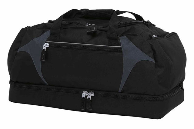 Durable black and dark grey sports bag with spacious compartments, adjustable shoulder strap, and reflective accents for athletes.