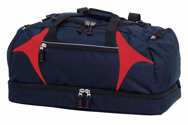 Spliced Zenith Sports Bag in dark blue and red, featuring durable material, spacious compartments, and comfortable carry options.