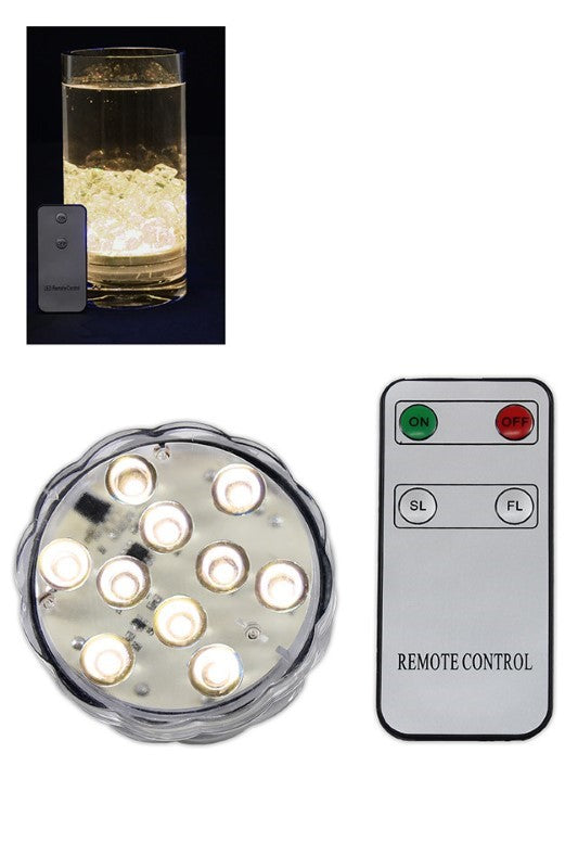 Set of 4 warm white LED submersible lights with remote control, ideal for cozy indoor and outdoor ambiance.