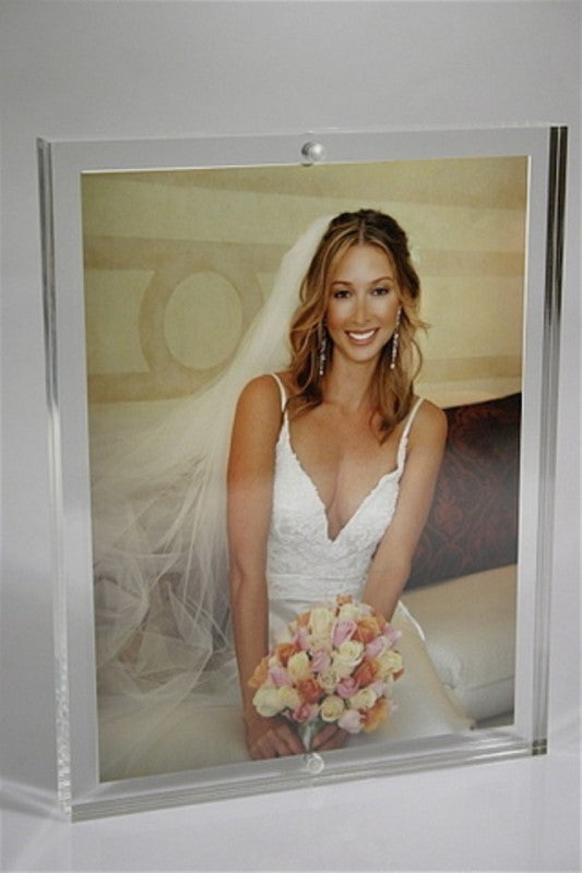 Modern acrylic photo frame 2 x 10mm, perfect for displaying 6x8 photos with crystal-clear clarity in any decor.