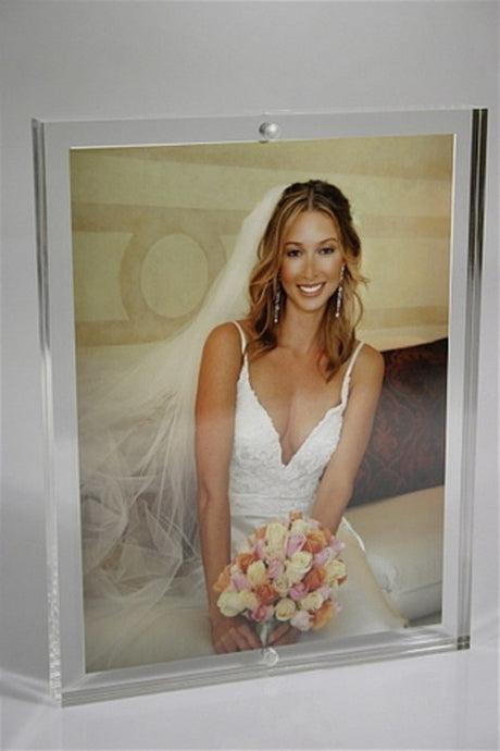 Modern acrylic photo frame 2 x 10mm, perfect for displaying 6x8 photos with crystal-clear clarity in any decor.