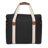 Sleek black Hamptons Cooler in luxury canvas with faux leather trim, 30L capacity, insulated, and stylish for outdoor use.