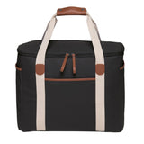 Sleek black Hamptons Cooler made of luxury waxed canvas, featuring 30L capacity, insulated lining, and faux leather trims.