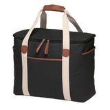Sleek black Hamptons Cooler with faux leather trim, insulated for 30L capacity, perfect for stylish outdoor adventures.