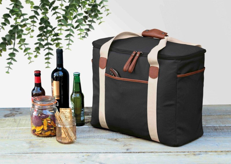 Hamptons Cooler in sleek black, crafted from luxury waxed canvas with faux leather, featuring insulated compartment and stylish design.