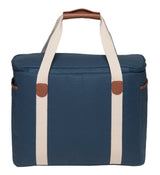 Hamptons Cooler in Dark Blue, featuring durable waxed canvas, insulated compartment, and stylish faux leather accents.