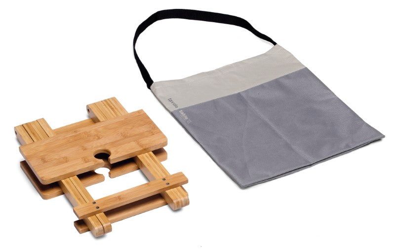 Tavolo Table featuring integrated wine holders, ideal for outdoor dining and easy transport in a durable carry bag.