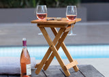Tavolo Table with dual wine holders, foldable bamboo design for outdoor dining, includes carry bag for easy transport.