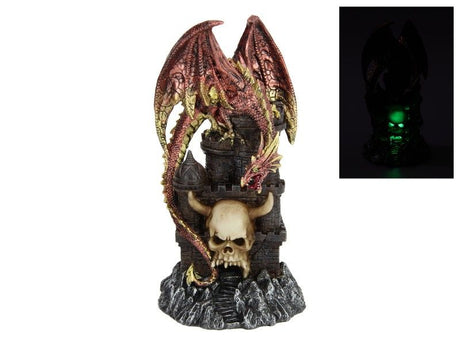 Intricately designed 27cm dragon perched on a detailed skull tower, perfect for fantasy collectors and gothic decor enthusiasts.