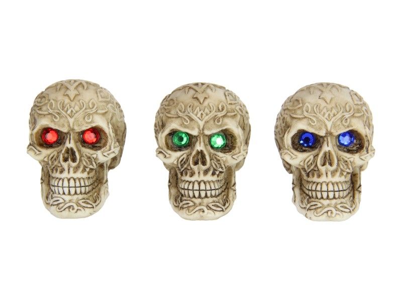 Colorful-eyed skull ornaments, 7cm each, in a pack of 12; perfect for Halloween or unique decor displays.