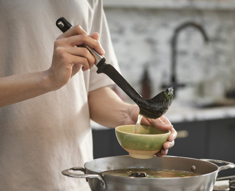 Joseph Joseph Elevate Silicone Ladle with deep silicone head and stainless-steel handle, designed for hygiene and mess prevention.