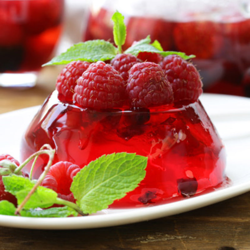 Raspberry jelly crystals in a 2KG pack, perfect for delightful desserts and snacks, made in New Zealand.