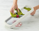 Joseph Joseph Multi-Grip Mandoline Plus for safe, versatile slicing with adjustable thickness and protective food grip.