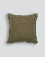 Olive green 50x50cm Otto cushion made of 100% cotton with a fringed edge, ideal for adding texture to your decor.