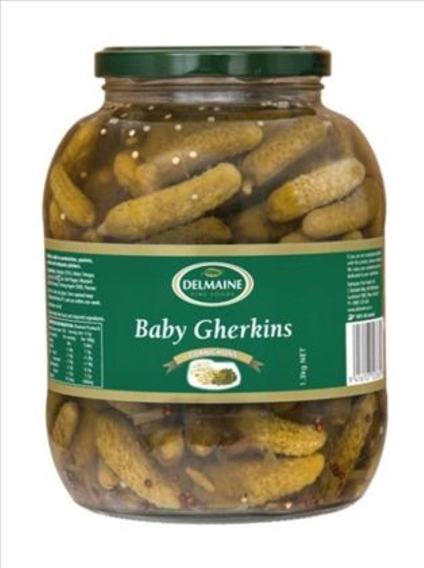 Delmaine's 1.3KG Gherkins Cornichon Baby, showcasing small crisp pickles for gourmet platters and versatile culinary uses.