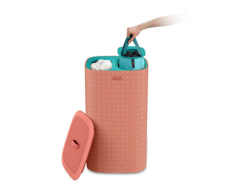 Joseph Joseph Tota Pop 60L laundry basket in coral with three tote bags for efficient laundry separation and easy transport.