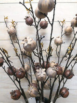 Vibrant artificial large rosehip spray, perfect for year-round decor and adding a natural touch without maintenance.