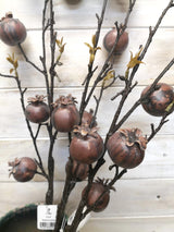 Vibrant artificial large rosehip spray adding elegance and warmth to home decor, ideal for year-round use and no upkeep.