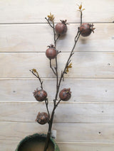 Vibrant artificial large rosehip spray, perfect for stylish home decor without maintenance.