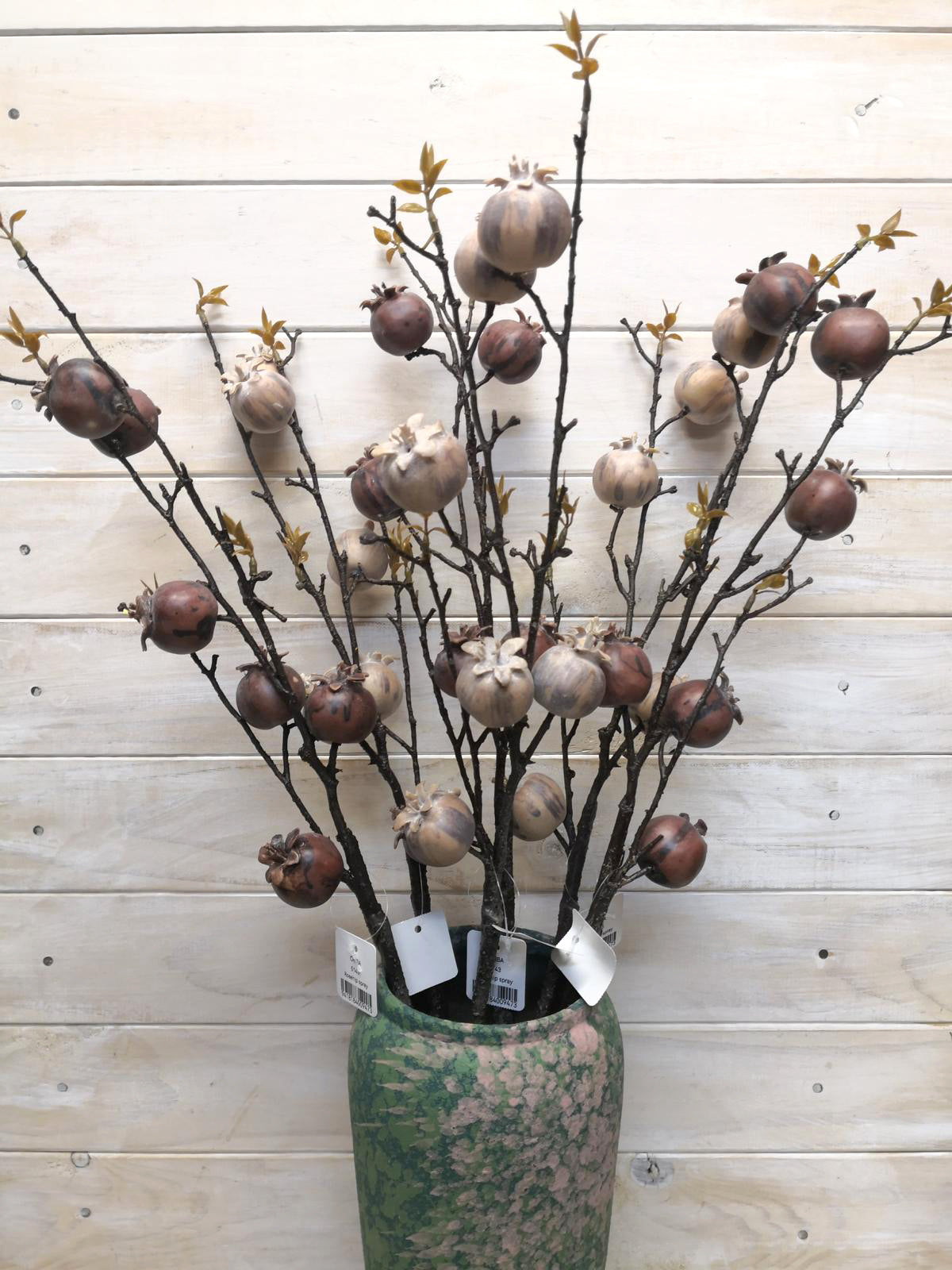 Lifelike large rosehip spray, perfect for adding a touch of nature to decor without maintenance.