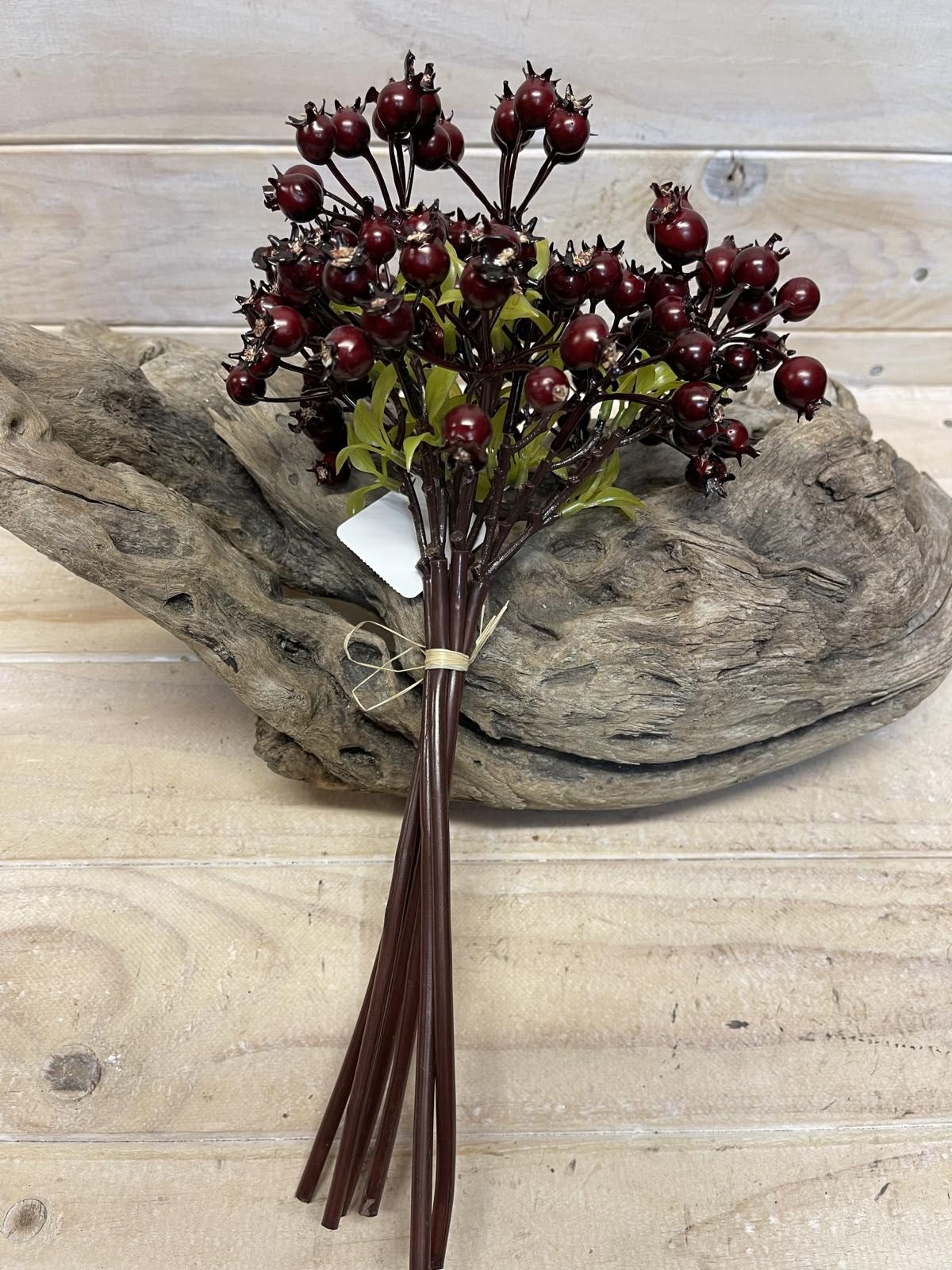 Vibrant artificial rosehip berry bundle, perfect for home decor, crafts, and arrangements, requiring no maintenance.