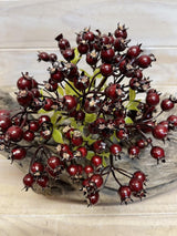 Artificial rosehip berry bundle featuring five vibrant, realistic faux berries for home decor and crafting.