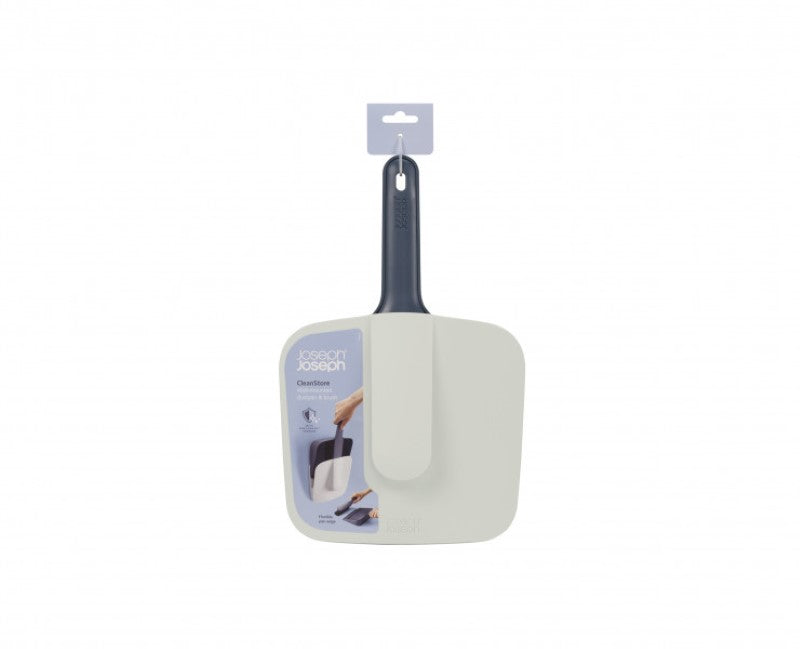 Joseph Joseph CleanStore Dustpan & Brush with wall-mount holder, soft bristles, rubber edge, and stepped lip for efficient cleaning.