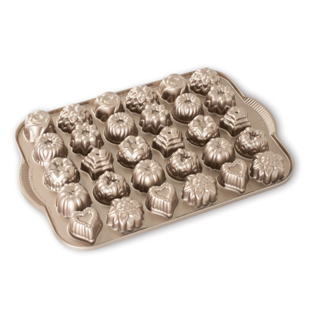 Toffee Tea Cakes & Candies Pan by Nordic Ware, featuring 30 detailed mini Bundt shapes for baking treats easily.