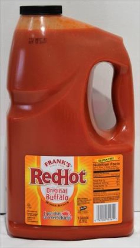 Tangy and spicy Frank's RedHot Buffalo Wing Sauce in a 3.78L bottle, perfect for marinating and dipping.