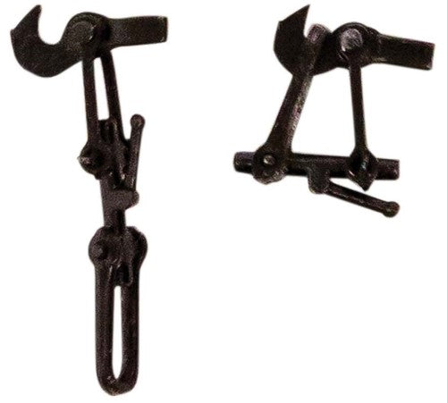 Small coupling assembly set of four, designed for reliable connectivity in model railway setups.