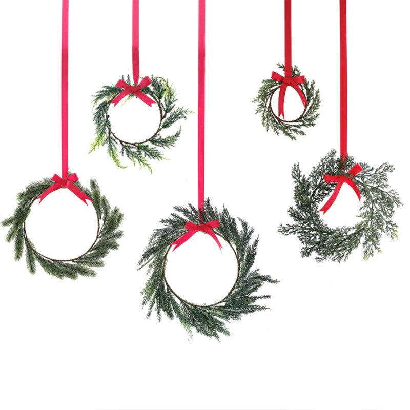 Rustic red mini foliage wreaths in various sizes, perfect for festive decor with red ribbon and bows for easy hanging.