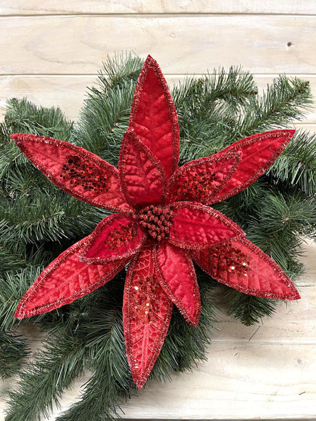 Lifelike long petal poinsettia stem, perfect for elegant home decor and versatile floral arrangements.