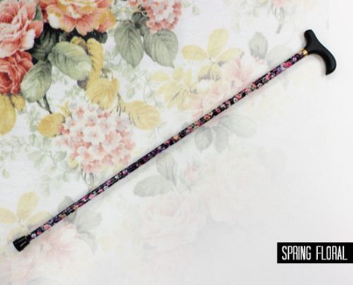 Colorful folding walking stick with a spring floral design, adjustable height, and compact storage for mobility support.