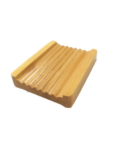 Natural wood soap dish with ribbed surface, promoting drainage and prolonging soap life while enhancing bathroom decor.