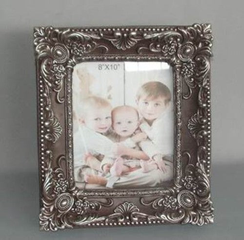 Antique-style 8x10 photo frame showcasing a vintage design to enhance your cherished memories.